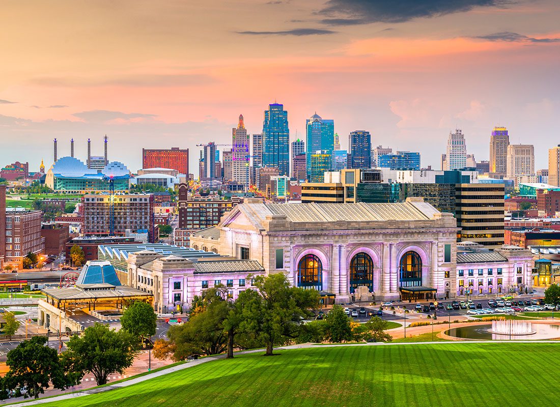 Contact - Aerial View of Kansas City, Missouri With Tall Business Buildings in the Background